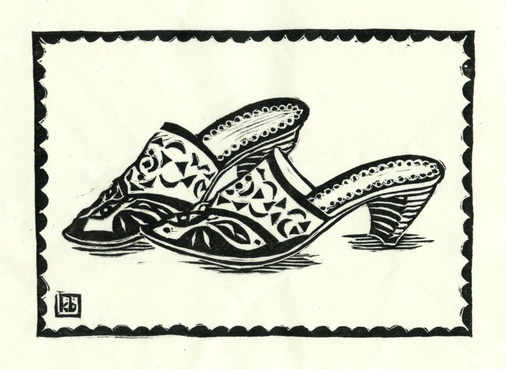 woodcut of pointed toe shoes