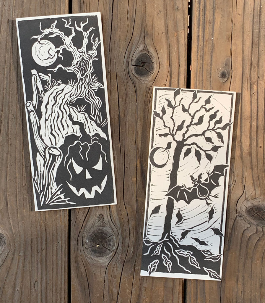linocut notecard halloween pumpkin bare trees moons in sky bat