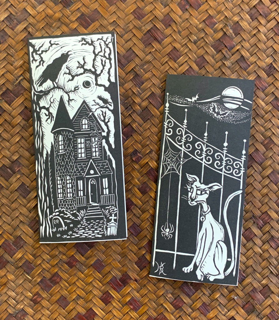 linocut notecard of haunted house and cat with spider